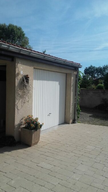 travaux peinture porte de garage 31880