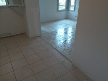 nettoyage sol après ponçage mur